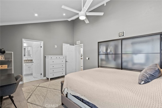 5230 Zelzah Ave Unit 3, Encino, CA 91316 - bedroom with ornamental molding, wood finished floors, high vaulted ceiling, recessed lighting, and connected bathroom