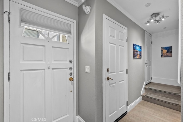 5230 Zelzah Ave Unit 3, Encino, CA 91316 - foyer entrance featuring ornamental molding and light wood-style floors