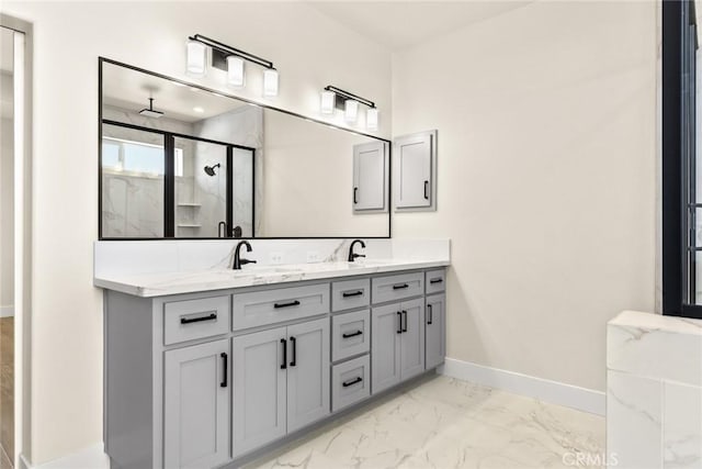 5035 San Juanico Dr, Chico, CA 95973 - full bathroom featuring a marble finish shower, marble look tile flooring, and double vanity