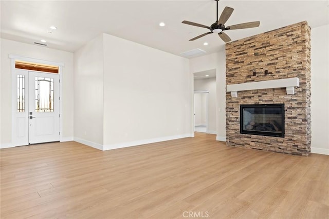 5035 San Juanico Dr, Chico, CA 95973 - unfurnished living room featuring light wood finished floors, recessed lighting, a ceiling fan, and a fireplace