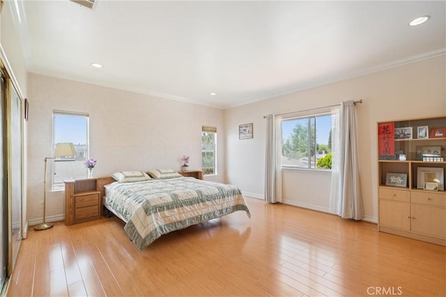 5939 N Vista St, San Gabriel, CA 91775 - bedroom with light wood-style floors, crown molding, and recessed lighting