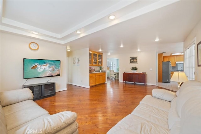5939 N Vista St, San Gabriel, CA 91775 - living room featuring arched walkways, recessed lighting, and light wood finished floors