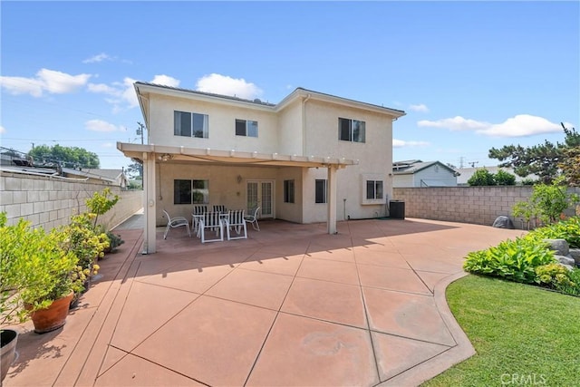 5939 N Vista St, San Gabriel, CA 91775 - back of house with stucco siding, a fenced backyard, a patio area, and french doors