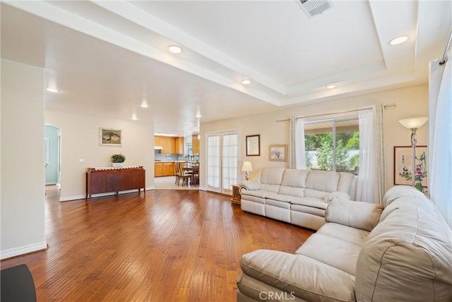 5939 N Vista St, San Gabriel, CA 91775 - living room featuring dark wood-style flooring, recessed lighting, and arched walkways
