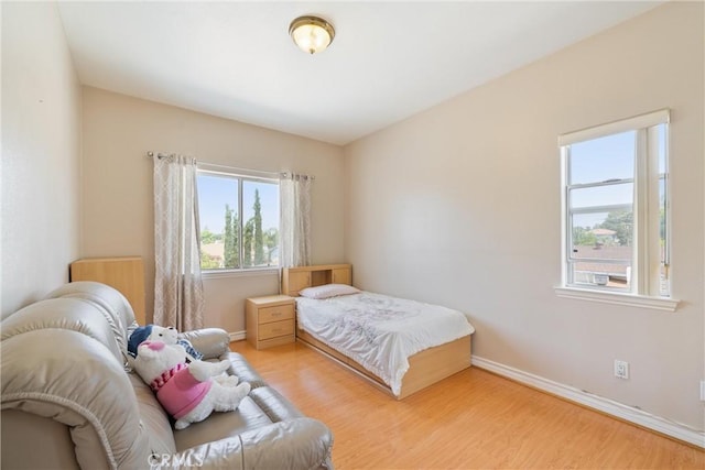 5939 N Vista St, San Gabriel, CA 91775 - bedroom with light wood-style floors and baseboards
