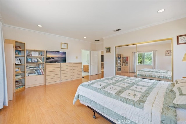5939 N Vista St, San Gabriel, CA 91775 - bedroom with wood finished floors, crown molding, a closet, and recessed lighting