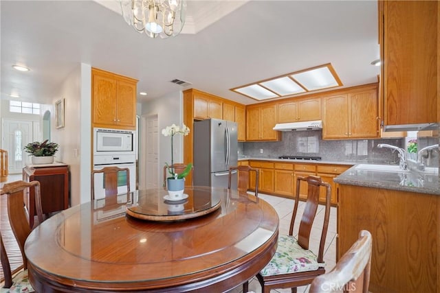 5939 N Vista St, San Gabriel, CA 91775 - dining room featuring recessed lighting, a chandelier, and light tile patterned flooring