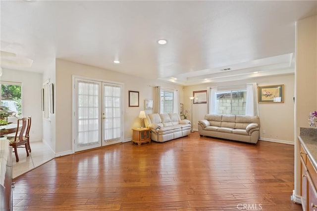5939 N Vista St, San Gabriel, CA 91775 - living area featuring hardwood / wood-style flooring, healthy amount of natural light, recessed lighting, and french doors