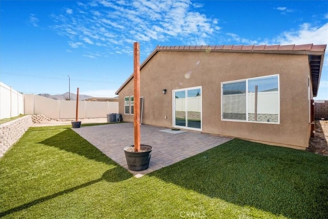 29045 Silver Stirrup Way, Winchester, CA 92596 - rear view of house featuring a fenced backyard, stucco siding, and a patio