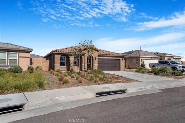29045 Silver Stirrup Way, Winchester, CA 92596 - view of front of house with stucco siding, concrete driveway, an attached garage, and a tile roof