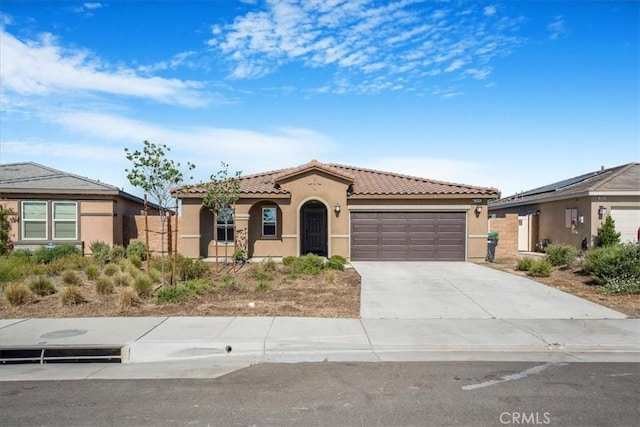 29045 Silver Stirrup Way, Winchester, CA 92596 - mediterranean / spanish home with a tile roof, a garage, stucco siding, and driveway