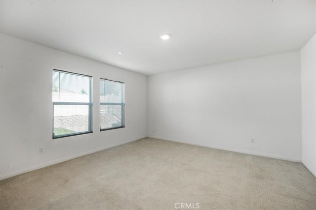 29045 Silver Stirrup Way, Winchester, CA 92596 - empty room featuring light colored carpet and recessed lighting