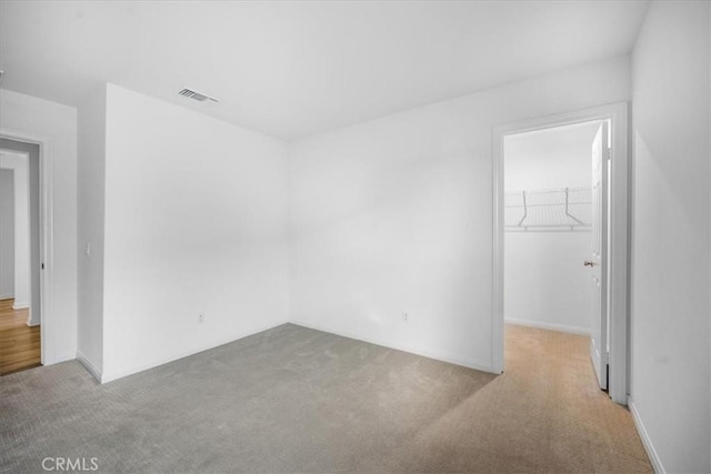 29045 Silver Stirrup Way, Winchester, CA 92596 - unfurnished bedroom featuring carpet, a closet, and a spacious closet