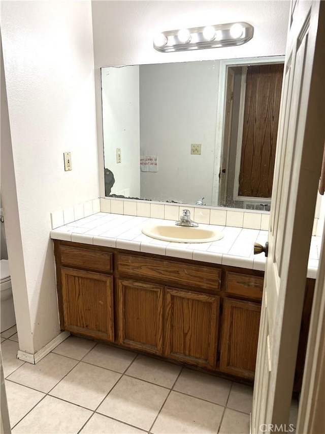 1061 N Perris Blvd, Perris, CA 92571 - half bath featuring tile patterned flooring and vanity