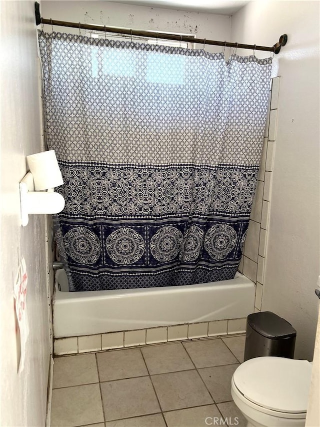 1061 N Perris Blvd, Perris, CA 92571 - bathroom with shower / bath combination with curtain and tile patterned flooring