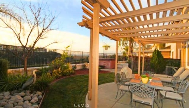 45211 Tioga St, Temecula, CA 92592 - fenced backyard with a hot tub, a pergola, a patio, and outdoor dining area