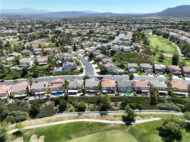 45211 Tioga St, Temecula, CA 92592 - aerial overview of property's location with a local golf course, nearby suburban area, and mountains