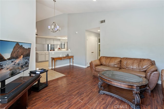 2837 Don Goodwin Dr, Riverside, CA 92507 - living area featuring high vaulted ceiling, a chandelier, and wood finished floors