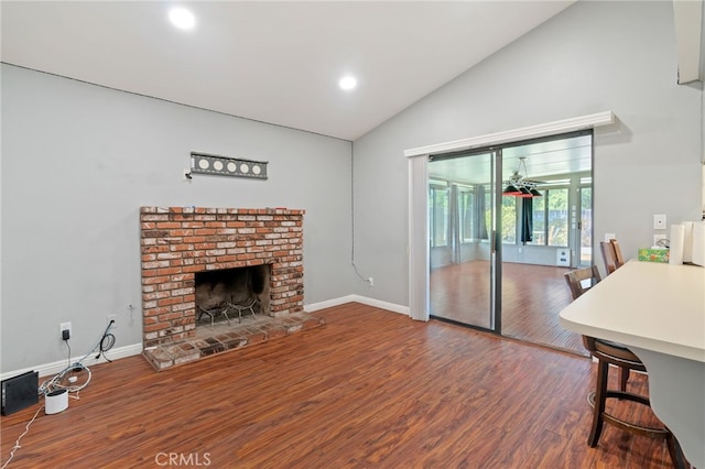 2837 Don Goodwin Dr, Riverside, CA 92507 - unfurnished living room featuring wood finished floors, high vaulted ceiling, recessed lighting, a brick fireplace, and a ceiling fan