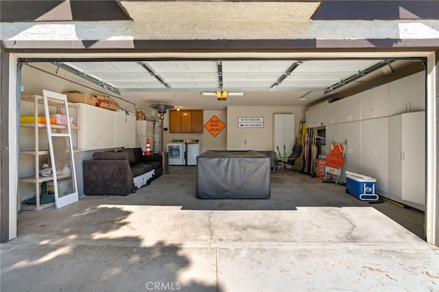 2837 Don Goodwin Dr, Riverside, CA 92507 - garage featuring separate washer and dryer, water heater, and a garage door opener