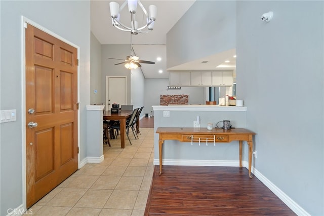 2837 Don Goodwin Dr, Riverside, CA 92507 - entrance foyer featuring ceiling fan, a chandelier, light wood finished floors, and high vaulted ceiling