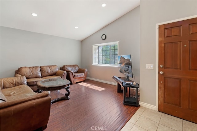 2837 Don Goodwin Dr, Riverside, CA 92507 - living room featuring vaulted ceiling, recessed lighting, and light wood-style floors