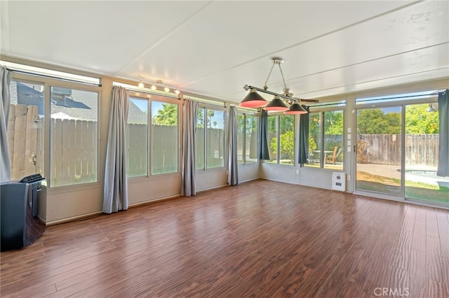 2837 Don Goodwin Dr, Riverside, CA 92507 - unfurnished sunroom featuring wood finished floors and plenty of natural light