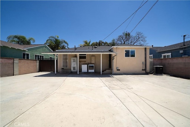 4425 Ashworth St, Lakewood, CA 90712 - back of house featuring stucco siding
