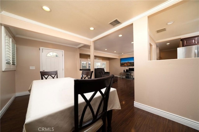 4425 Ashworth St, Lakewood, CA 90712 - dining area featuring dark wood-style flooring, ornamental molding, and recessed lighting
