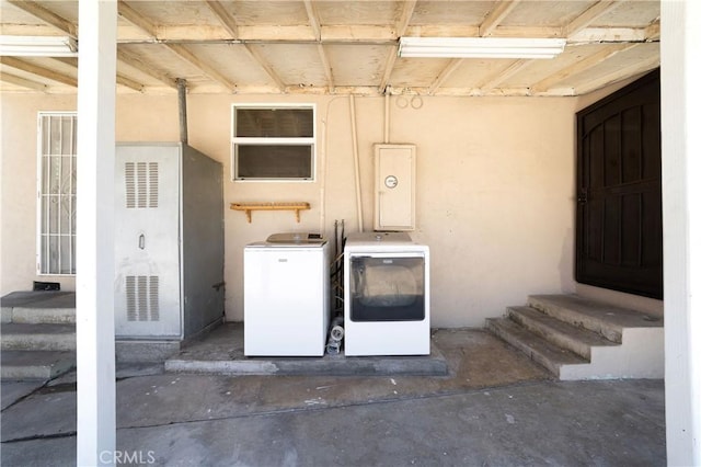 4425 Ashworth St, Lakewood, CA 90712 - entrance to property with washer and dryer and stucco siding