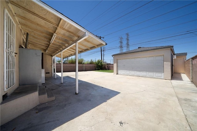 4425 Ashworth St, Lakewood, CA 90712 - view of patio / terrace with an outdoor structure and a garage