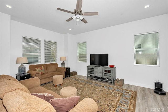 253 Peters Ln S, Madera, CA 93636 - living area with wood finished floors, a ceiling fan, plenty of natural light, and recessed lighting
