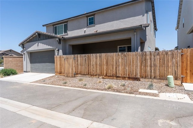 253 Peters Ln S, Madera, CA 93636 - view of front facade featuring stucco siding and driveway