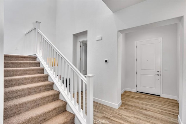253 Peters Ln S, Madera, CA 93636 - stairway featuring wood finished floors and baseboards