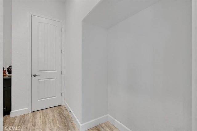 253 Peters Ln S, Madera, CA 93636 - corridor with light wood finished floors and baseboards