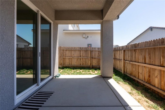 253 Peters Ln S, Madera, CA 93636 - fenced backyard featuring a patio