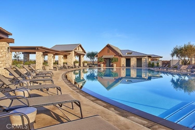 253 Peters Ln S, Madera, CA 93636 - community pool featuring a patio area