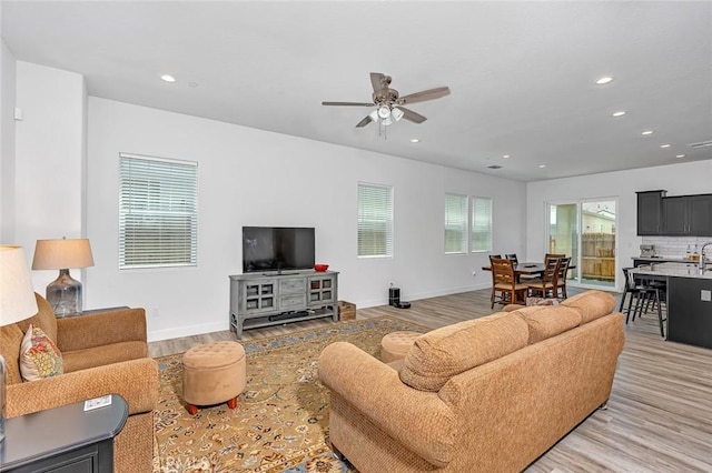 253 Peters Ln S, Madera, CA 93636 - living area with a ceiling fan, light wood finished floors, and recessed lighting