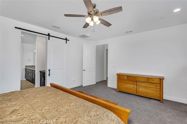 253 Peters Ln S, Madera, CA 93636 - carpeted bedroom featuring a barn door, recessed lighting, ceiling fan, and ensuite bathroom
