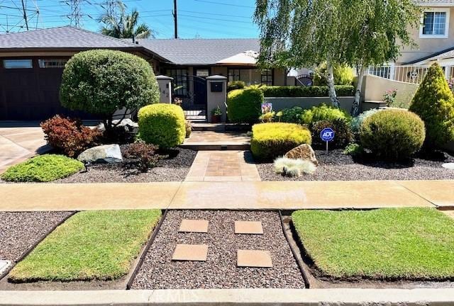 11142 Bertha Pl, Cerritos, CA 90703 - view of front of property with concrete driveway and a garage