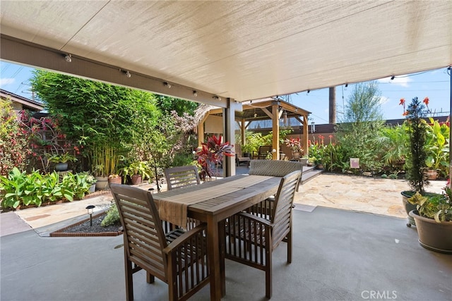 11142 Bertha Pl, Cerritos, CA 90703 - fenced backyard with a patio area, outdoor dining space, and a gazebo