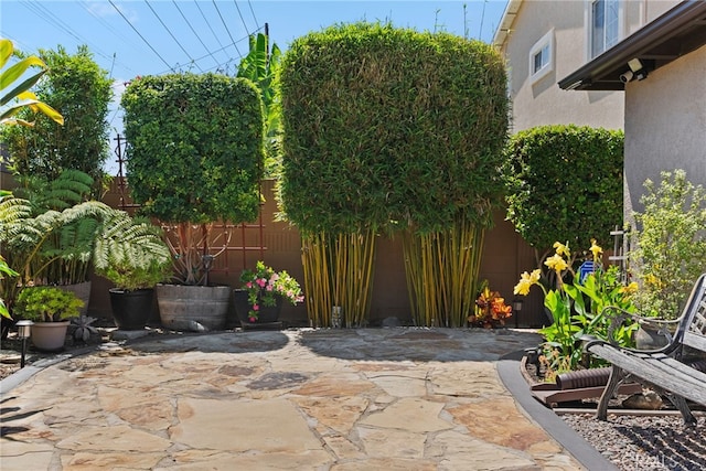 11142 Bertha Pl, Cerritos, CA 90703 - fenced backyard with a patio area