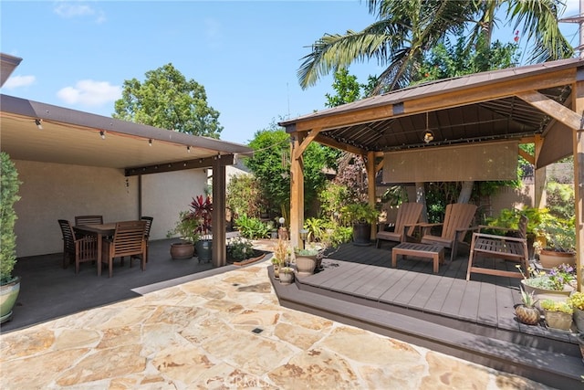 11142 Bertha Pl, Cerritos, CA 90703 - view of patio featuring a gazebo, a wooden deck, and outdoor dining area