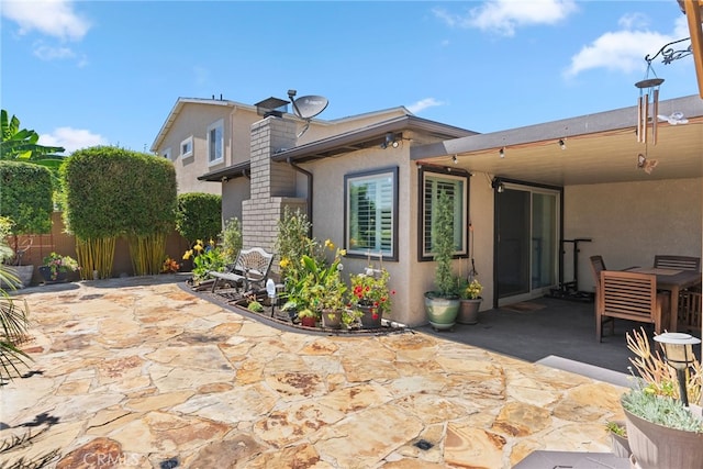 11142 Bertha Pl, Cerritos, CA 90703 - rear view of house with a patio and stucco siding