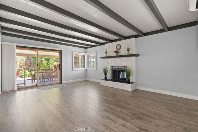 11142 Bertha Pl, Cerritos, CA 90703 - unfurnished living room featuring beamed ceiling, a fireplace, and wood finished floors