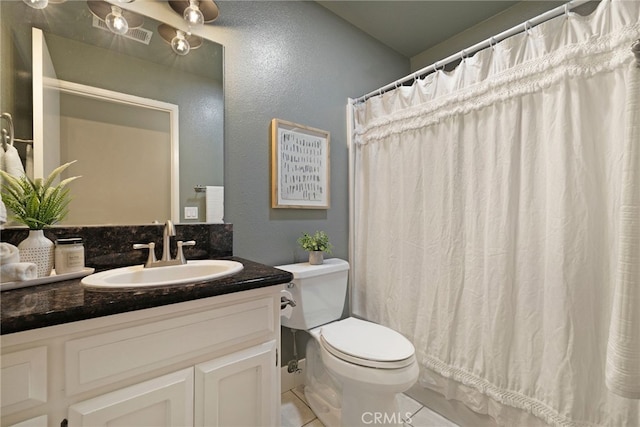 812 Collindale Ct, Chico, CA 95926 - bathroom with vanity, tile patterned flooring, a textured wall, and curtained shower
