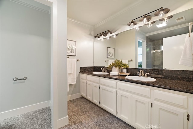 812 Collindale Ct, Chico, CA 95926 - bathroom with granite tiled floors, crown molding, double vanity, and a shower with shower door