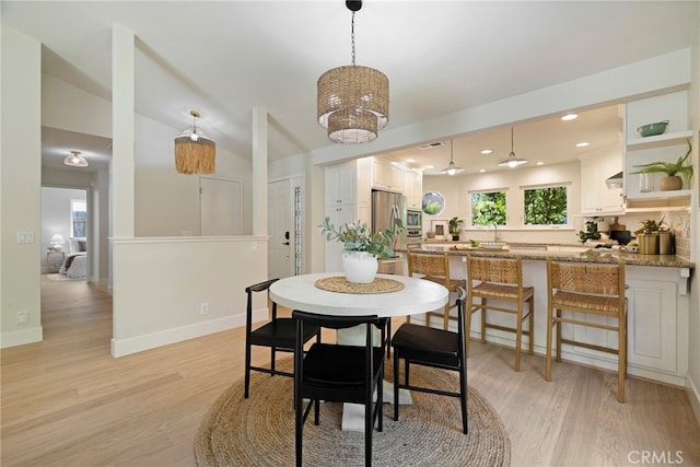812 Collindale Ct, Chico, CA 95926 - dining room featuring light wood-style floors, a chandelier, and recessed lighting