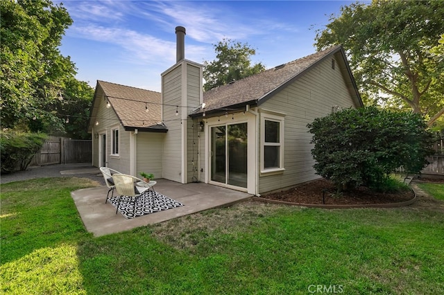 812 Collindale Ct, Chico, CA 95926 - rear view of house with a patio, a chimney, and a shingled roof