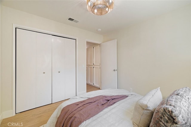 812 Collindale Ct, Chico, CA 95926 - bedroom with light wood-style floors and a closet